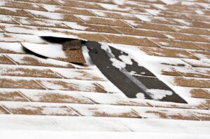 winter roof damage sign in Asheboro, NC