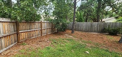 Fenced yard before the renovation, Pinehurst NC