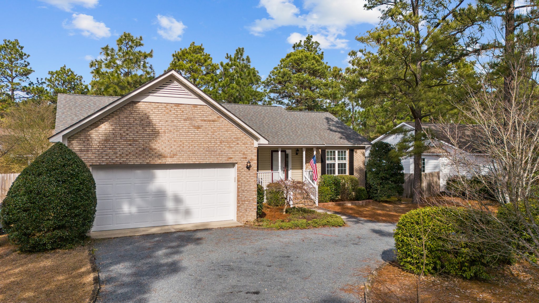 Front of the renovated house with the two-car garage, Longleaf Drive East, Pinehurst NC