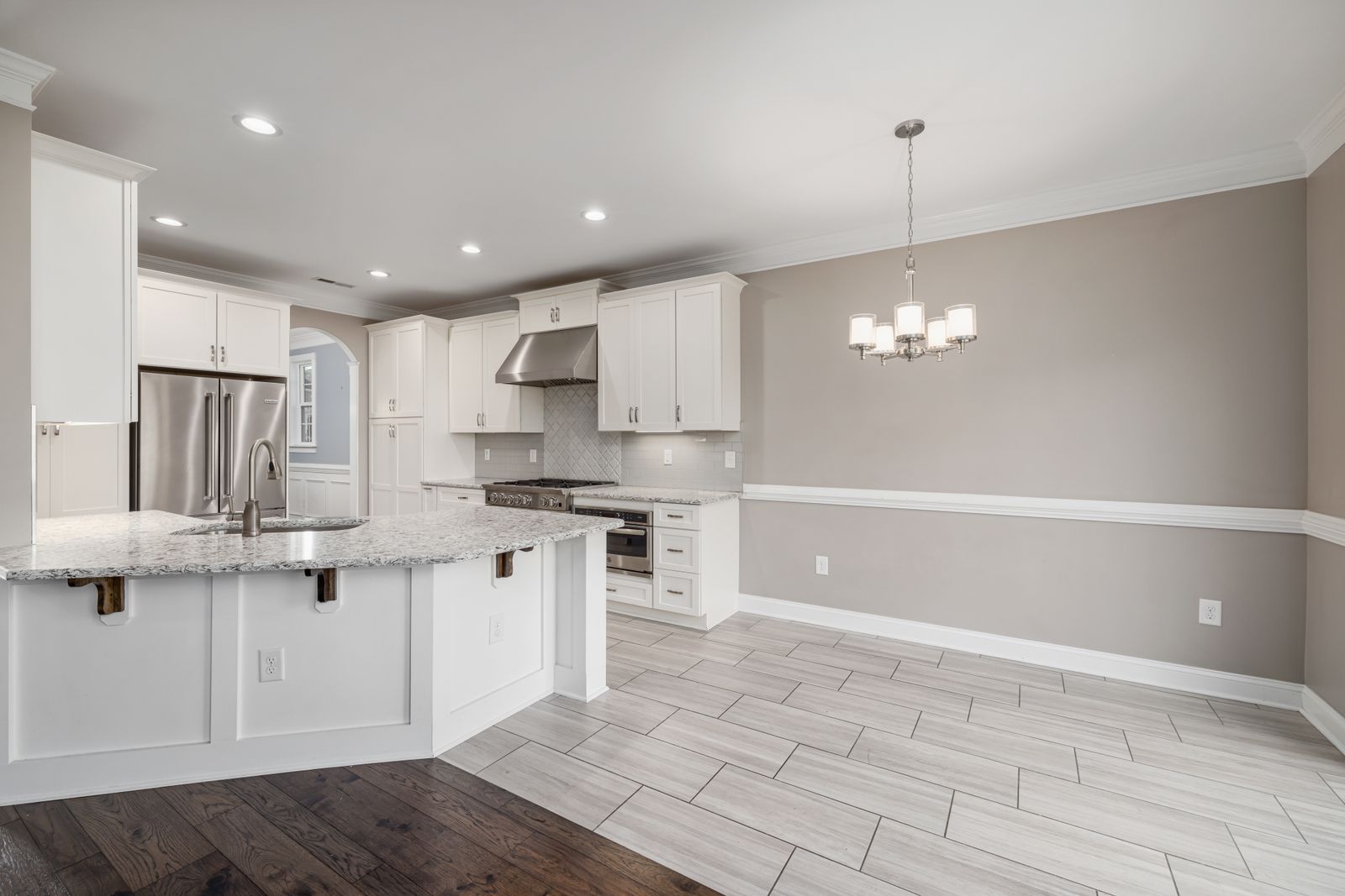 Remodeled kitchen with white cabinets